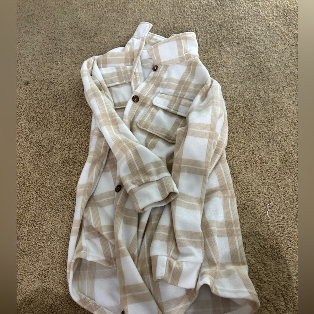 Flannel. Pretty long. Size small
